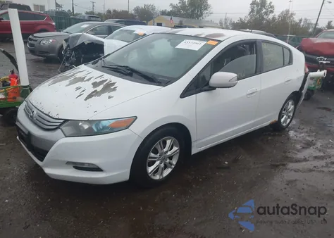 2010 Honda Insight Ex z USA, uszkodzony, nr VIN JHMZE2H7XAS007399
